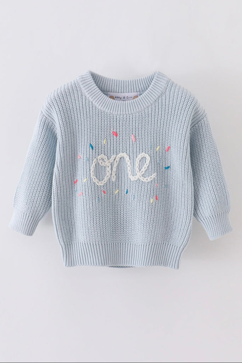 Hand-embroidered “One” sweater
